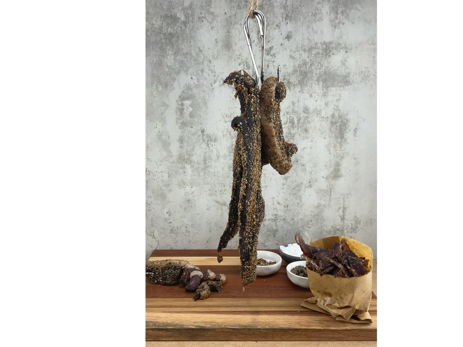 The image shows a package of biltong, a popular South African dried meat snack.