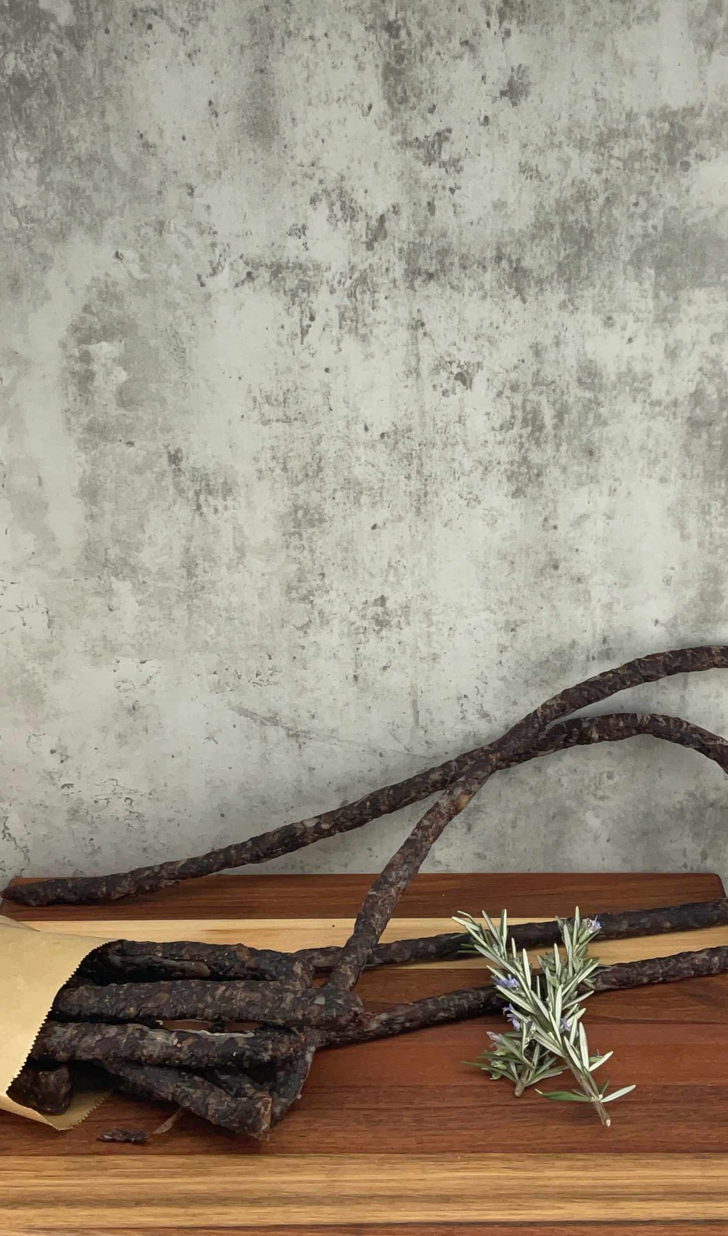 The image shows a package of biltong, a popular South African dried meat snack.