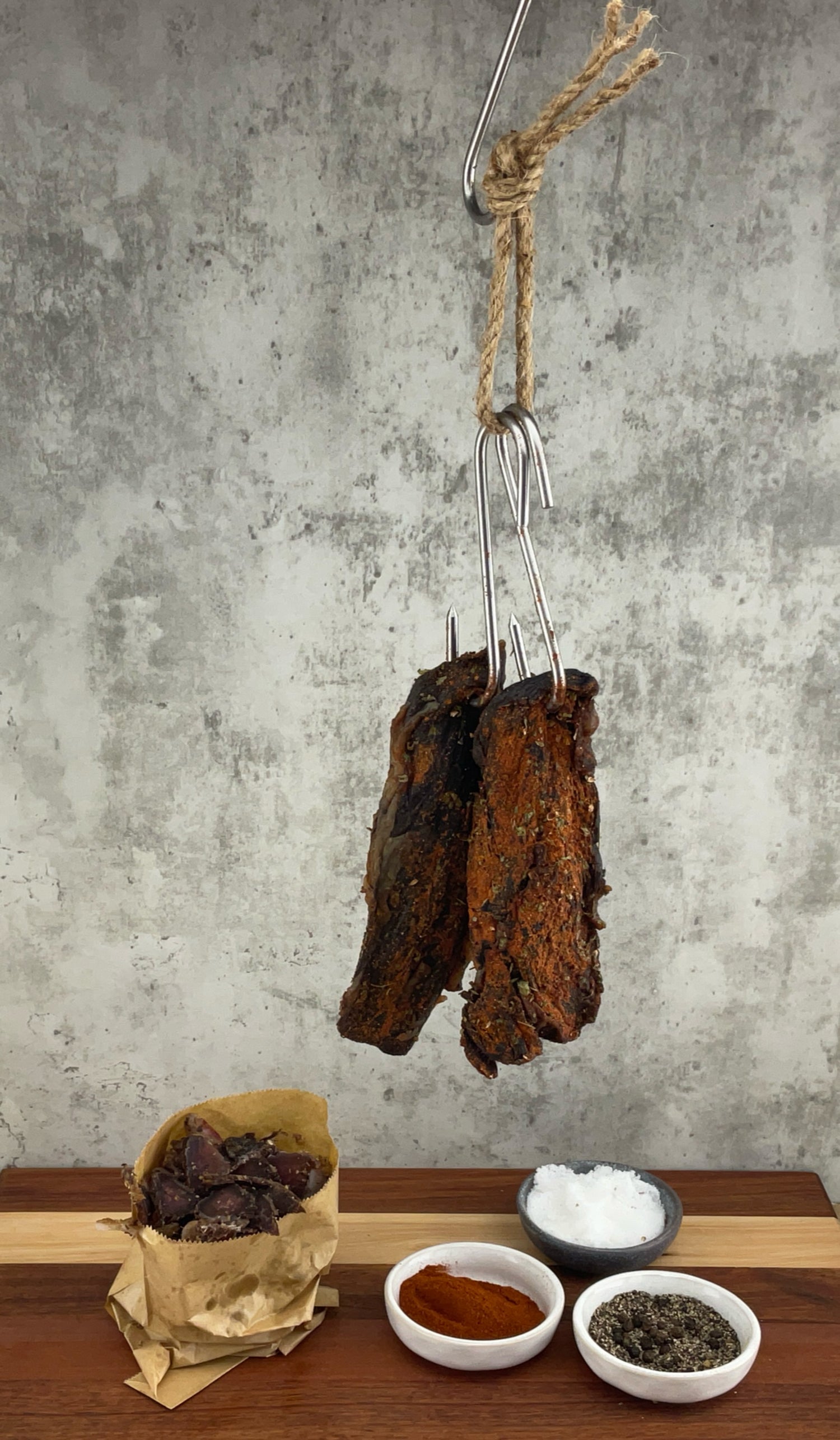 The image shows a package of biltong, a popular South African dried meat snack.